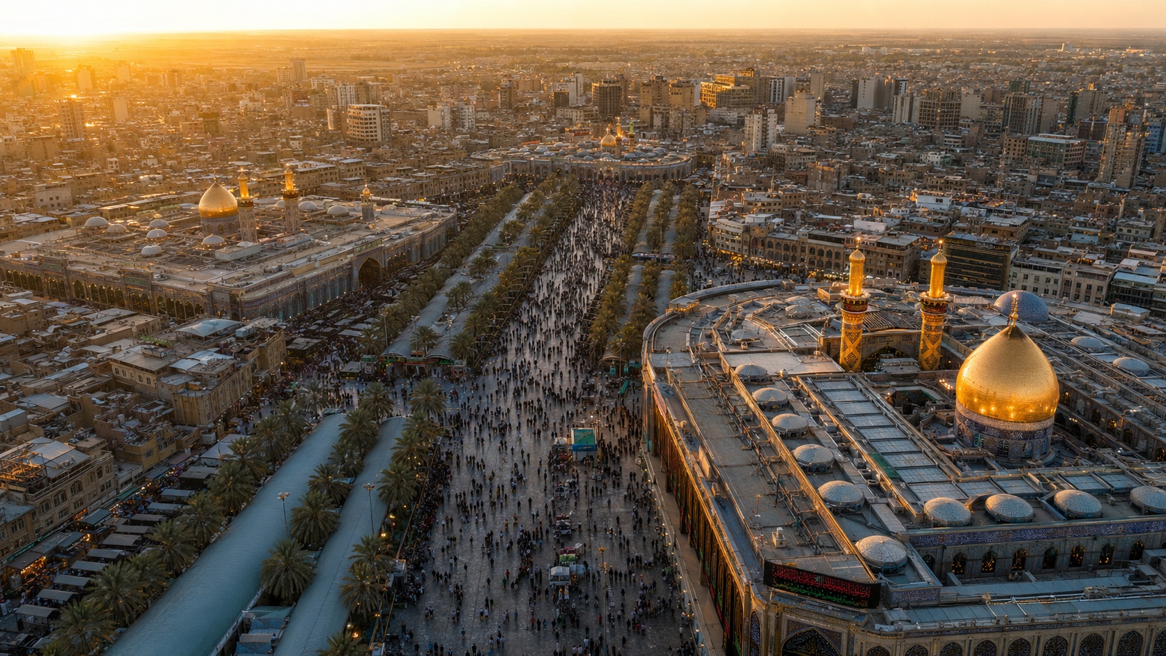 نمای هوایی حرمین کربلا در ساعت طلایی با گنبدهای طلایی و نخل‌ها